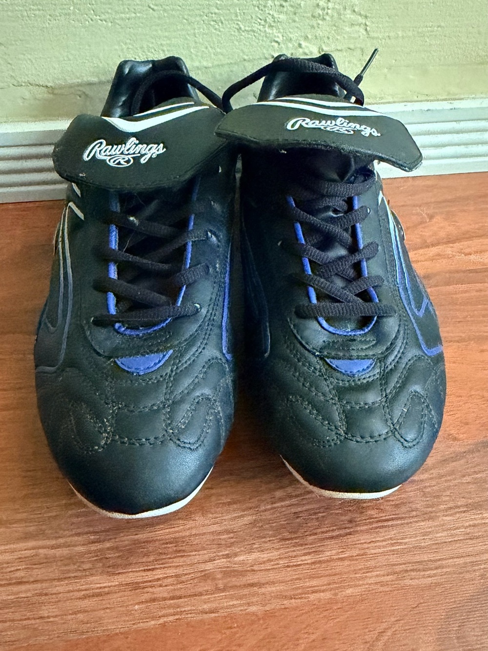 Rawlings Black Athletic Shoes with Blue Accents